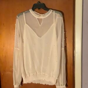 Beautiful chiffon top accented with pearls